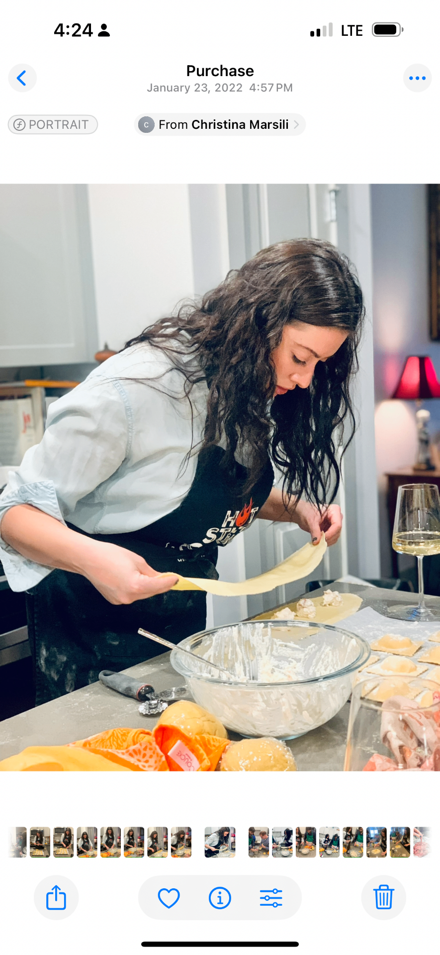 Nikki hand-stretching fresh pasta dough in a home kitchen